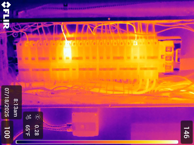 Thermal scan showing overheating breakers at 100 degrees Fahrenheit indicating potential failure
