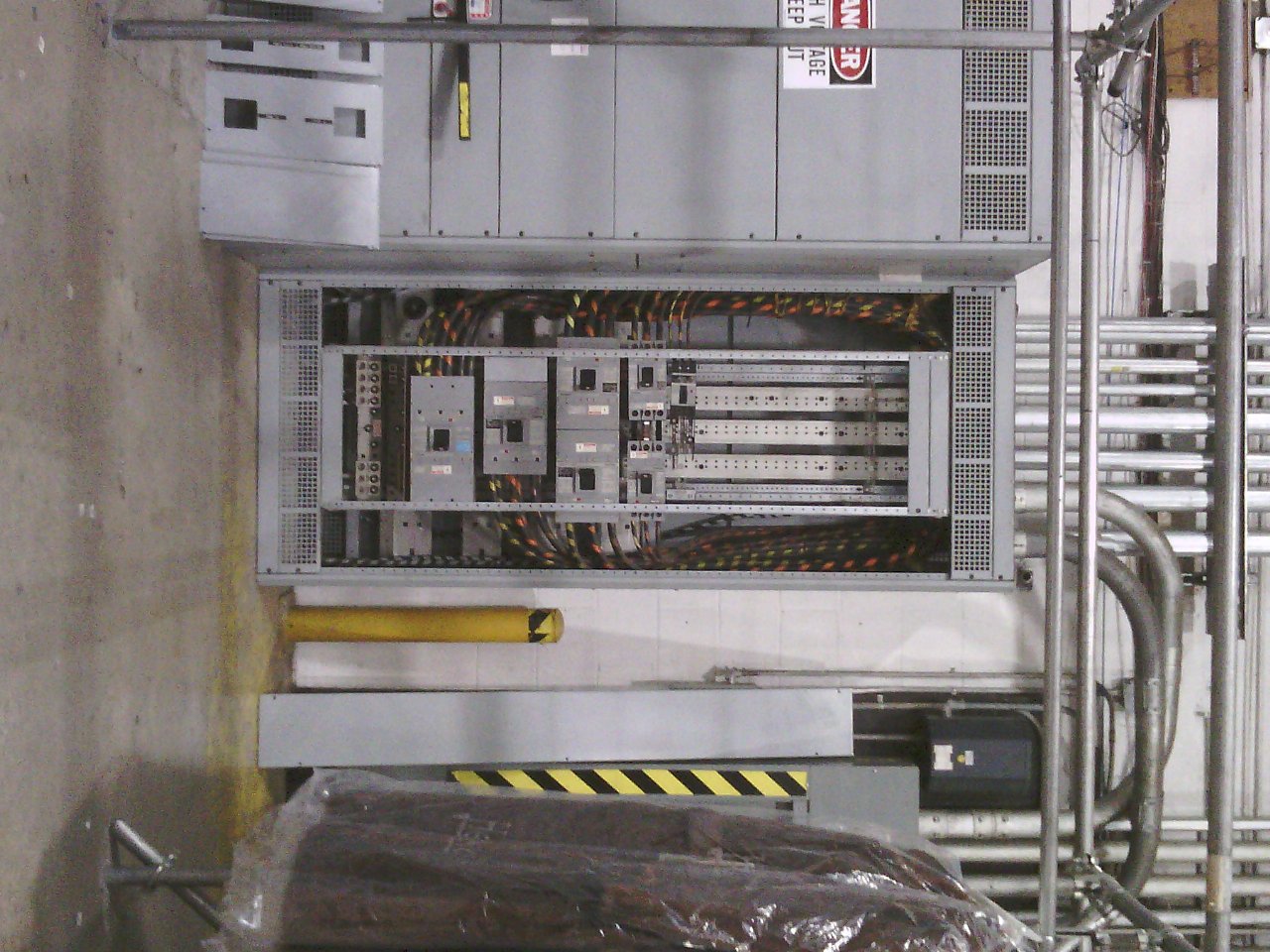 Normal visible light photo of electrical panel showing no apparent issues